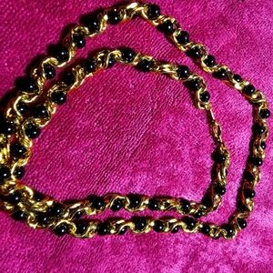 Black Pearl and gold tone necklace